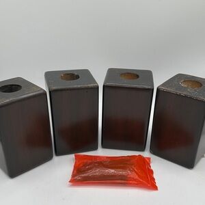 Set of four dark brown wooden furniture legs and hardware
